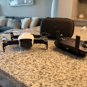 DJI Black and White Drone with Controller